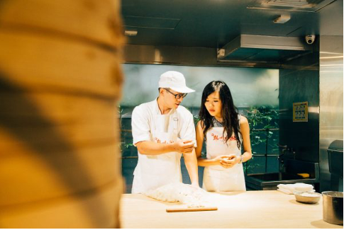 A Man and Woman in a Kitchen